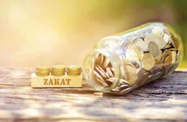 bigstock-zakat-word-golden-coin-stacked-171811499-1526918502451