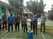 DPK KNPI Bogor barat, bekerja sama dengan GM FKPPI dan Shobat DM 24 Lakukan Penyemprotan Desinfektan dan Bagikan Masker
