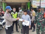Ops Yustisi dan Pembagian Masker di Wilayah Hukum Polsek Cariu