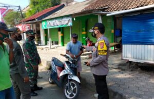 Polsek Cariu Berikan Himbauan Kepada Masyarakat Tentang PPKM Level 2