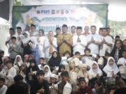 Fetty Anggraenidini dan Yasin Maskur Santuni 200 Anak Yatim di PWI Kota Bogor