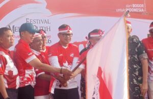 Arak 5 Bendera Raksasa di FMP 2026, Wamendagri Minta Semangat Kirab Menyatu dalam Keseharian Warga